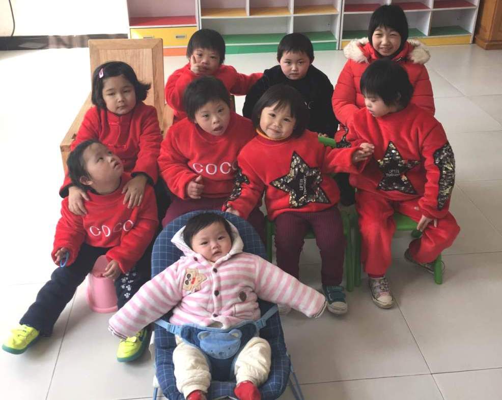 1517385253105479.jpg 上饶项目的孩子过年穿上新衣服.jpg